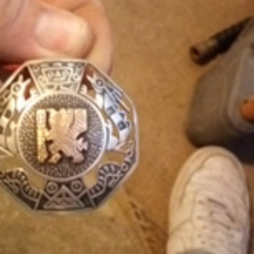 Silver and 18k gold pendant Aztec